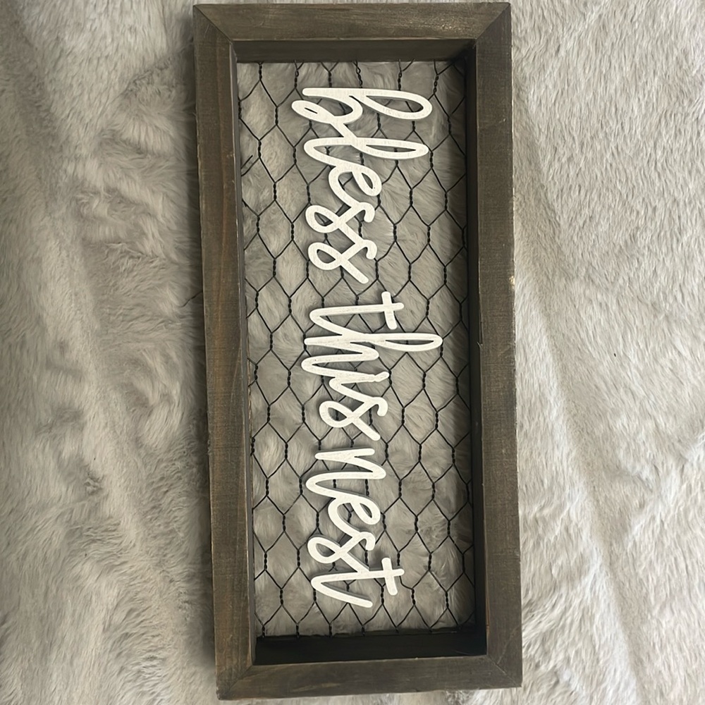 11 x 5 “BLESS THIS NEST” wood hanging sign. Brown